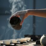 일상을 바꾸는 웰니스 문화, 지속가능한 건강 루틴이 뜬다 person pouring hot water on white cup